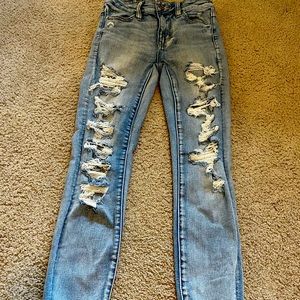 distressed american eagle, denim blue jeans.
